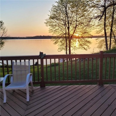 Enjoy lakeside living at its finest on beautiful Stalker Lake in on Stalker Lake Golf Course in Minnesota - for sale on GolfHomes.com, golf home, golf lot