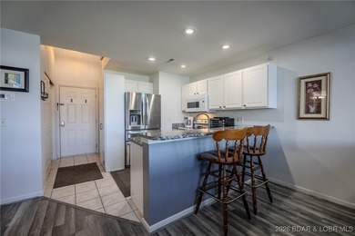 Top floor 2-bedroom loft unit spanning over 1400sqft and even on Lake Valley Country Club in Missouri - for sale on GolfHomes.com, golf home, golf lot