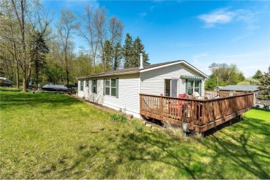 Enjoy lakeside living at its finest on beautiful Stalker Lake in on Stalker Lake Golf Course in Minnesota - for sale on GolfHomes.com, golf home, golf lot