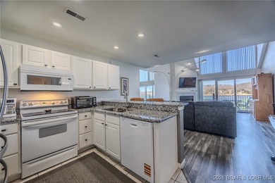 Top floor 2-bedroom loft unit spanning over 1400sqft and even on Lake Valley Country Club in Missouri - for sale on GolfHomes.com, golf home, golf lot