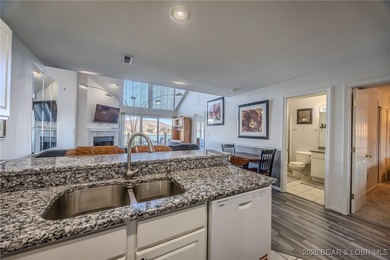 Top floor 2-bedroom loft unit spanning over 1400sqft and even on Lake Valley Country Club in Missouri - for sale on GolfHomes.com, golf home, golf lot