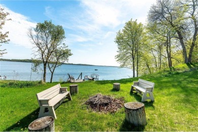 Enjoy lakeside living at its finest on beautiful Stalker Lake in on Stalker Lake Golf Course in Minnesota - for sale on GolfHomes.com, golf home, golf lot
