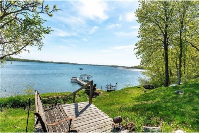 Enjoy lakeside living at its finest on beautiful Stalker Lake in on Stalker Lake Golf Course in Minnesota - for sale on GolfHomes.com, golf home, golf lot