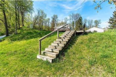 Enjoy lakeside living at its finest on beautiful Stalker Lake in on Stalker Lake Golf Course in Minnesota - for sale on GolfHomes.com, golf home, golf lot