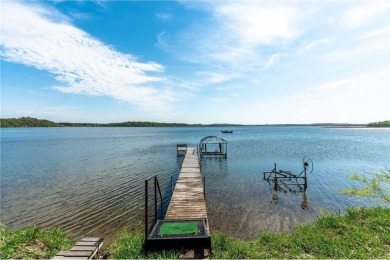 Enjoy lakeside living at its finest on beautiful Stalker Lake in on Stalker Lake Golf Course in Minnesota - for sale on GolfHomes.com, golf home, golf lot