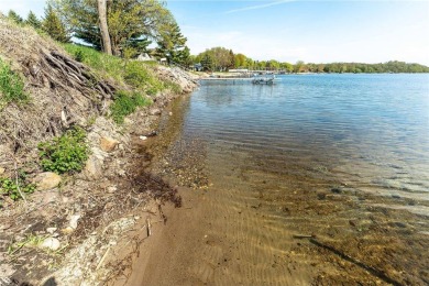Enjoy lakeside living at its finest on beautiful Stalker Lake in on Stalker Lake Golf Course in Minnesota - for sale on GolfHomes.com, golf home, golf lot