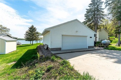 Enjoy lakeside living at its finest on beautiful Stalker Lake in on Stalker Lake Golf Course in Minnesota - for sale on GolfHomes.com, golf home, golf lot
