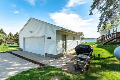 Enjoy lakeside living at its finest on beautiful Stalker Lake in on Stalker Lake Golf Course in Minnesota - for sale on GolfHomes.com, golf home, golf lot