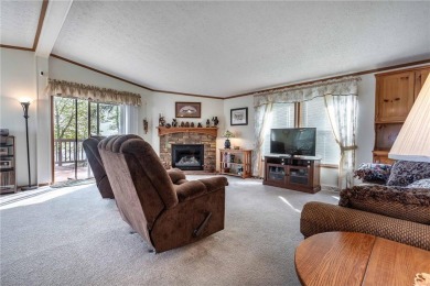 Enjoy lakeside living at its finest on beautiful Stalker Lake in on Stalker Lake Golf Course in Minnesota - for sale on GolfHomes.com, golf home, golf lot