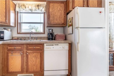 Enjoy lakeside living at its finest on beautiful Stalker Lake in on Stalker Lake Golf Course in Minnesota - for sale on GolfHomes.com, golf home, golf lot