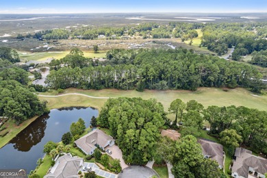 Discover the perfect blend of tranquility and convenience with on The Club At Osprey Cove in Georgia - for sale on GolfHomes.com, golf home, golf lot