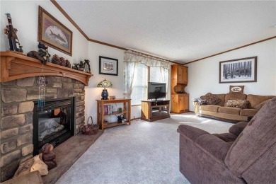 Enjoy lakeside living at its finest on beautiful Stalker Lake in on Stalker Lake Golf Course in Minnesota - for sale on GolfHomes.com, golf home, golf lot