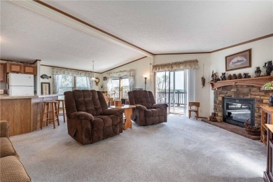Enjoy lakeside living at its finest on beautiful Stalker Lake in on Stalker Lake Golf Course in Minnesota - for sale on GolfHomes.com, golf home, golf lot