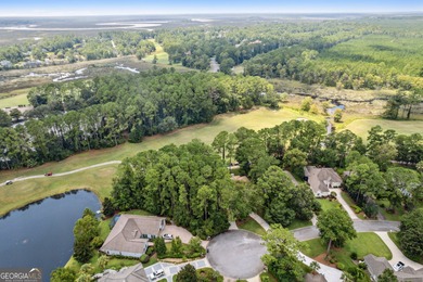Discover the perfect blend of tranquility and convenience with on The Club At Osprey Cove in Georgia - for sale on GolfHomes.com, golf home, golf lot