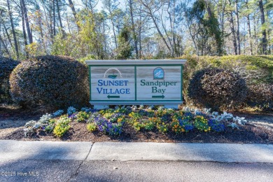 Welcome to Sunset Villas at Sandpiper Bay, where coastal living on Sandpiper Bay Golf and Country Club in North Carolina - for sale on GolfHomes.com, golf home, golf lot