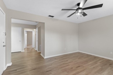 Buyer financing fell through. Well maintained quadraplex that is on Hilaman Park Golf Course in Florida - for sale on GolfHomes.com, golf home, golf lot