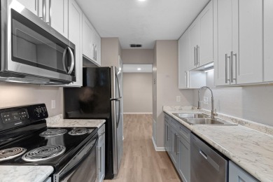 Buyer financing fell through. Well maintained quadraplex that is on Hilaman Park Golf Course in Florida - for sale on GolfHomes.com, golf home, golf lot