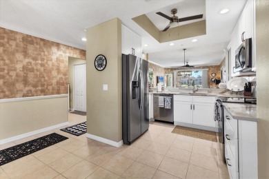 Discover this beautifully renovated ground-floor, fully on Heritage Oaks Golf and Country Club in Florida - for sale on GolfHomes.com, golf home, golf lot