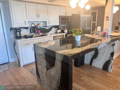 Newly Renovated

Updated Kitchen: Sleek black-and-white on Crystal Lake Country Club in Florida - for sale on GolfHomes.com, golf home, golf lot