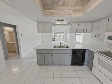 Corner end-unit villa now available in the desirable 55+ on Beacon Woods Golf Club in Florida - for sale on GolfHomes.com, golf home, golf lot