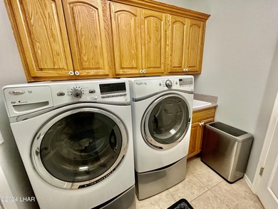 Located on the 4th fairway of the prestigious Huukan Golf Course on Desert Lakes Golf Course in Arizona - for sale on GolfHomes.com, golf home, golf lot