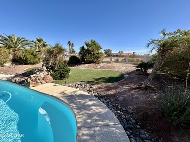 Located on the 4th fairway of the prestigious Huukan Golf Course on Desert Lakes Golf Course in Arizona - for sale on GolfHomes.com, golf home, golf lot