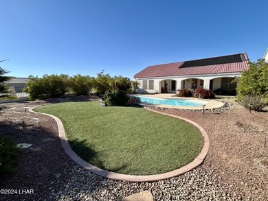 Located on the 4th fairway of the prestigious Huukan Golf Course on Desert Lakes Golf Course in Arizona - for sale on GolfHomes.com, golf home, golf lot