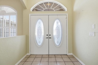 PRICED TO SELL!  A 2,390 SQ FOOT POOL HOME WITH A VIEW OF THE on Glen Lakes Country Club in Florida - for sale on GolfHomes.com, golf home, golf lot