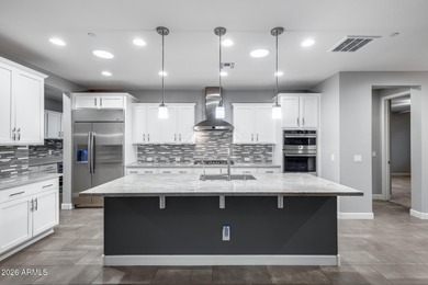 Retire in ultimate comfort and elegance with this beautifully on Trilogy Golf Club At Vistancia in Arizona - for sale on GolfHomes.com, golf home, golf lot