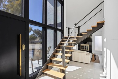 Welcome to this beautifully updated 3-bedroom, 3-bath home on Bent Tree Country Club in Florida - for sale on GolfHomes.com, golf home, golf lot