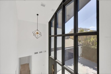 Welcome to this beautifully updated 3-bedroom, 3-bath home on Bent Tree Country Club in Florida - for sale on GolfHomes.com, golf home, golf lot