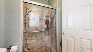 Enjoy maintenance-free living in this 4bd/3ba/OS 2-gar/2940sf on Ptarmigan Golf Course in Colorado - for sale on GolfHomes.com, golf home, golf lot