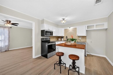 Welcome to this beautifully renovated 3 bedroom, 2 bath home on Lake Kiowa Golf Course in Texas - for sale on GolfHomes.com, golf home, golf lot