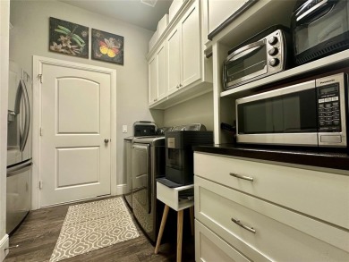 Experience resort-style living in this custom 3 bedroom, 2.1 on Rock Creek Golf Club in Texas - for sale on GolfHomes.com, golf home, golf lot