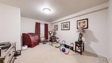 Enjoy maintenance-free living in this 4bd/3ba/OS 2-gar/2940sf on Ptarmigan Golf Course in Colorado - for sale on GolfHomes.com, golf home, golf lot