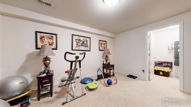 Enjoy maintenance-free living in this 4bd/3ba/OS 2-gar/2940sf on Ptarmigan Golf Course in Colorado - for sale on GolfHomes.com, golf home, golf lot