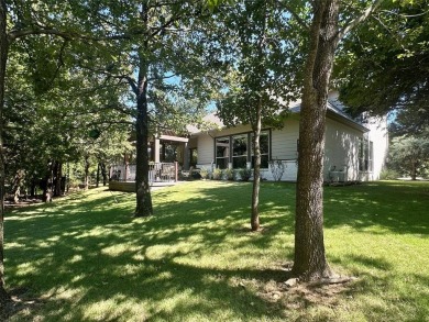 Experience resort-style living in this custom 3 bedroom, 2.1 on Rock Creek Golf Club in Texas - for sale on GolfHomes.com, golf home, golf lot