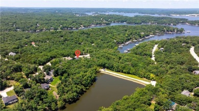 Immaculate Four Seasons home situated on an interior lake! This on Seasons Ridge At Four Seasons in Missouri - for sale on GolfHomes.com, golf home, golf lot