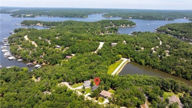 Immaculate Four Seasons home situated on an interior lake! This on Seasons Ridge At Four Seasons in Missouri - for sale on GolfHomes.com, golf home, golf lot