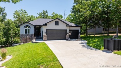 Immaculate Four Seasons home situated on an interior lake! This on Seasons Ridge At Four Seasons in Missouri - for sale on GolfHomes.com, golf home, golf lot