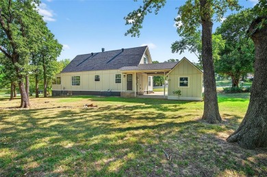 Welcome to this beautifully renovated 3 bedroom, 2 bath home on Lake Kiowa Golf Course in Texas - for sale on GolfHomes.com, golf home, golf lot