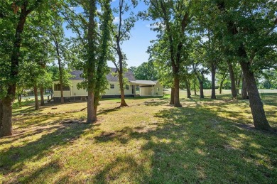 Welcome to this beautifully renovated 3 bedroom, 2 bath home on Lake Kiowa Golf Course in Texas - for sale on GolfHomes.com, golf home, golf lot