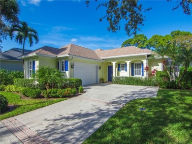 This courtyard pool home is nestled on a lush golf course on Indian River Club in Florida - for sale on GolfHomes.com, golf home, golf lot