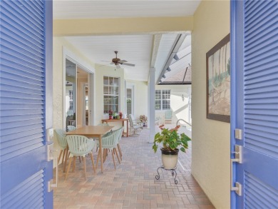 This courtyard pool home is nestled on a lush golf course on Indian River Club in Florida - for sale on GolfHomes.com, golf home, golf lot