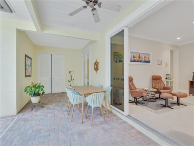 This courtyard pool home is nestled on a lush golf course on Indian River Club in Florida - for sale on GolfHomes.com, golf home, golf lot