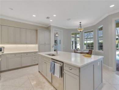 This courtyard pool home is nestled on a lush golf course on Indian River Club in Florida - for sale on GolfHomes.com, golf home, golf lot