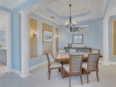 This courtyard pool home is nestled on a lush golf course on Indian River Club in Florida - for sale on GolfHomes.com, golf home, golf lot