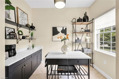 Gorgeous, spacious end unit with views of trees and water on The Rookery At Marco in Florida - for sale on GolfHomes.com, golf home, golf lot