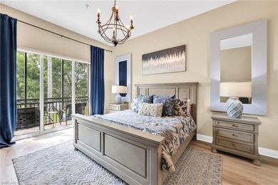 Gorgeous, spacious end unit with views of trees and water on The Rookery At Marco in Florida - for sale on GolfHomes.com, golf home, golf lot