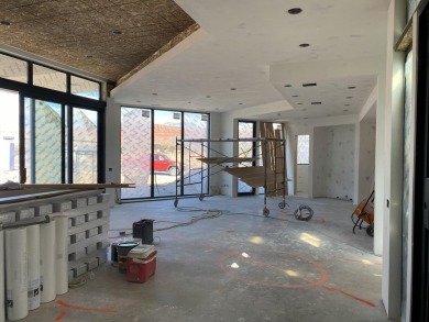 New Custom home nestled in the Lava field in ENTRADA's gated on Entrada at Snow Canyon in Utah - for sale on GolfHomes.com, golf home, golf lot